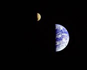 A Long Way From Home - 
This image of the Earth and moon in a single frame, the first of its kind ever taken by a spacecraft, was recorded on Sept. 18, 1977, by Voyager 1 when it was 7.25 million miles from Earth. The moon is at the top of the picture and beyond the Earth as viewed by Voyager.